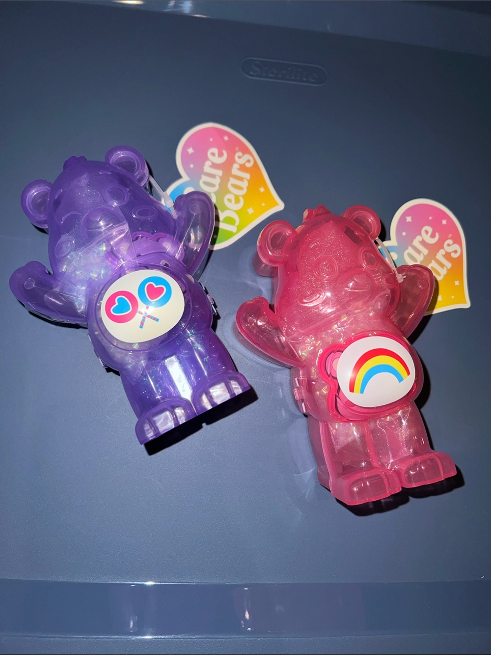 NWT 2pc pink & purple Carebear slime cases